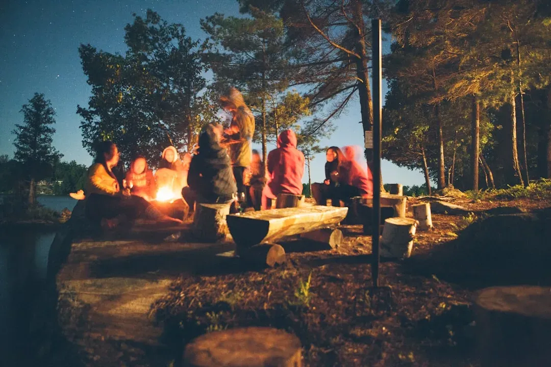 glamping campsite with twinkling lights and a starry sky