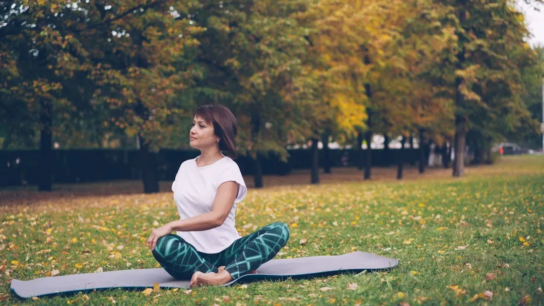 Guest practicing yoga in a peaceful outdoor glamping setting