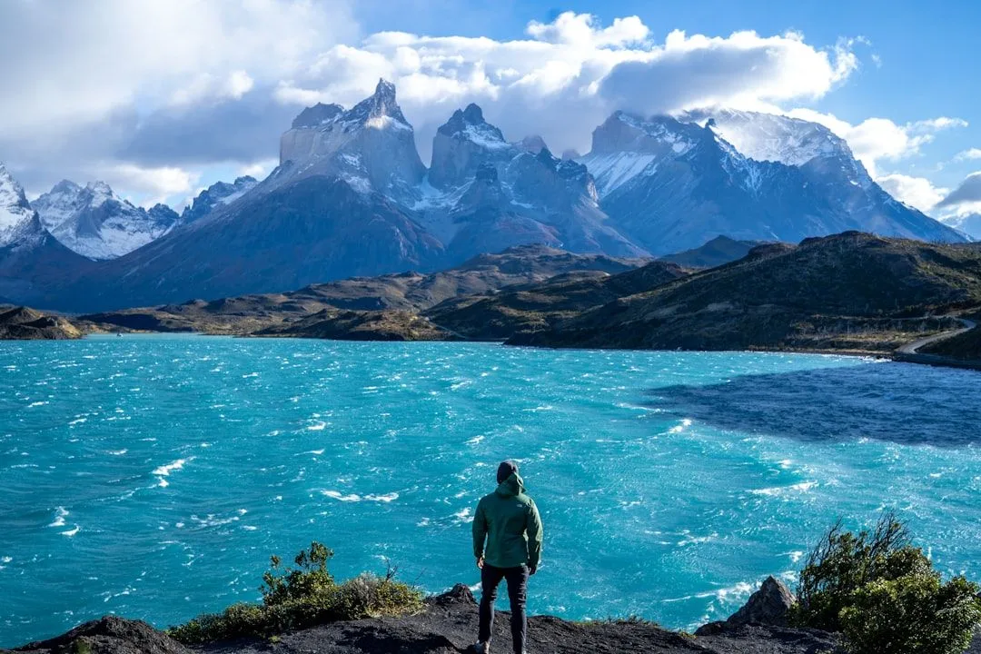 The Cuernos del Paine peaks rising above a turquoise lake in Torres del Paine National Park, Chile